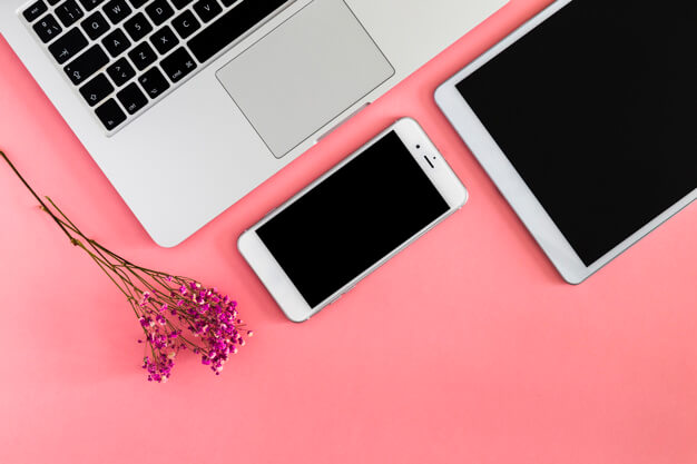 Apple Products on Pink Table